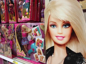 Barbie dolls are shown in the toy department of a retail store in Encinitas, California in this October 14, 2014 file photo.  REUTERS/Mike Blake/Files