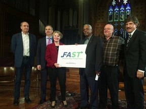 Friends and Allies of SmartTrack (FAST) at Trinity United Church on Thursday, Oct. 15, 2015. From left to right: lead organizer Tom Allison along with board members David Young, Andrea Geddes Poole, Alvin Curling (chair), Kyle Rae and Michael Brooks. (Don Peat/Toronto Sun)