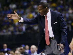 Toronto Raptors head coach Dwane Casey instructs his team during the first half of a preseason NBA basketball game against the Golden State Warriors, Monday, Oct. 5, 2015, in San Jose, Calif.  (AP/Marcio Jose Sanchez)