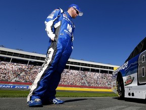 Dale Earnhardt Jr. stands on the grid prior to last week’s Bank of America 500, where he finished 28th. (AFP)