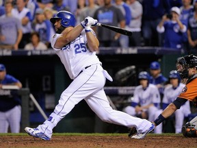 Royals DH Kendrys Morales hits a three-run home run in the eighth inning against the Astros during Game 5 of the AL Divison Series at Kauffman Stadium in Kansas City, Mo., on Wednesday, Oct. 14, 2015. (Ed Zurga/Getty Images/AFP)