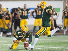 Grant Shaw kicks a field goal during a game against the Alouettes in Montreal in August. (The Canadian Press)