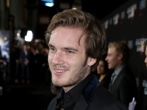 In this Oct. 28, 2013 file photo, Felix Kjellberg, aka PewDiePie, arrives at the Los Angeles premiere of "Ender's Game" at TCL Chinese Theatre in Los Angeles. (Photo by Matt Sayles/Invision/AP, File)