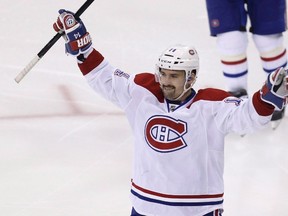 Montreal Canadiens' Tomas Plekanec celebrates after Alex Galchenyuk scored during overtime against the New York Rangers in Game 3 of the NHL hockey Stanley Cup playoffs Eastern Conference finals, May 22, 2014, in New York.  THE CANADIAN PRESS/AP, Seth Wenig/Files