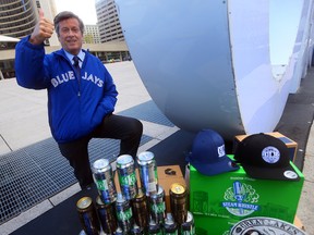 Mayor John Tory announces he will bet Toronto's beer with Kansas City Mayor Sly James, who has offered ribs and sauces, as the Blue Jays take on the Royals in MLB playoffs. (DAVE ABEL/Toronto Sun)