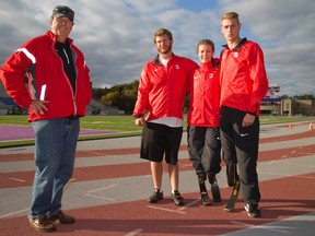 Coach John Allen, with para-athletes Kevin Strybosch, 23, Madison Wilson-Walker, 18, and Cody Salomons, 21, are heading to the world championships this month in Doha, Qatar. (MIKE HENSEN, The London Free Press)