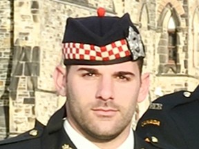 Cpl Nathan Cirillo is pictured in this handout photo taken from a group photo of the Canadian Army Contingent in front of the tomb of the Unknown Soldier in Ottawa on October 19, 2014, courtesy of The Canadian Armed Forces. A gunman attacked Canada's parliament on October 22, 2014, with shots fired near where Prime Minister Stephen Harper was speaking, and Cirillo was killed at a nearby war memorial, stunning the Canadian capital.  REUTERS/Corporal Mlani Girard/The Canadian Armed Forces/Handout