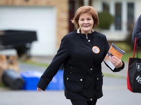 London-Fanshawe NDP candidate Irene Mathyssen knocks on doors on Folkstone Court in London on Friday. Craig Glover/The London Free Press/Postmedia Network