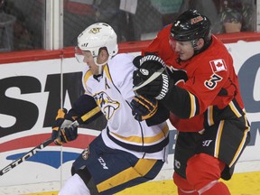 Ladislav Smid, shown here during a game in 2014, has not played since January as he recovers from surgery on a herniated disc in his neck. (Jim Wells, Postmedia Network)