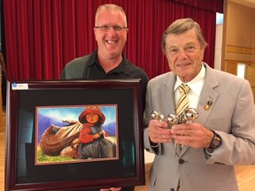 Guest Pete Kool (left) joins Dr. Tom Greidanus at the annual Operation Esperanza fundraising auction. (SUPPLIED)