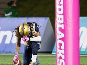 Tony Burnett reacts after mishandling the ball on Friday. (THE CANADIAN PRESS)