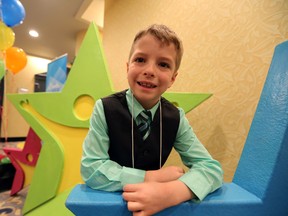 7 year old Austin Neufeld pose for a photo at the Great Kids Awards at Fantasyland Hotel in Edmonton, Alberta on Sunday, April 27, 2014. Austin won a Great Kid award for raising money for the Terry Fox Foundation.  Perry Mah/ Edmonton Sun