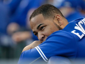 Jays Edwin Encarnacion watches late in the game.  The Toronto Blue Jays  and Kansas City Royals MLB action game two in Kansas City on Saturday October 17, 2015. (Craig Robertson/Toronto Sun/Postmedia Network)