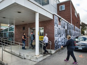 Voters head to the advance polls for Canada's federal election at a polling station in Toronto on Friday, October 9 2015.  THE CANADIAN PRESS/Aaron Vincent Elkaim