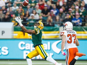 Adarius Bowman snags a Mike Reilly pass to record a 69-yard touchdown in the second quarter of Saturday's game against the Lions. (Ian Kucerak, Edmonton Sun)