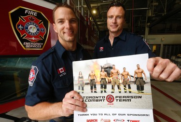 James Bates (L) and Tim Lisecky (R) firefighters with the six person Toronto Pearson Combat Team are off to the Scott Firefighter Combat World Challenge in Montgomery, Alabama this Monday. The created a firefighter calendar they are selling with portions going to two charities and help fund their trip to the Games. Friday October 16, 2015. Jack Boland/Toronto Sun/Postmedia Network