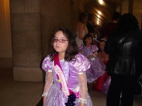 Emily Kadolph transforms into a princess for the day at the Manitoba Legislature Sunday. (Jim Bender, Winnipeg Sun, Postmedia Network)