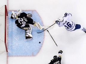 Penguins goalie Marc-Andre Fleury stops Maple Leafs’ Nick Spaling during Saturday’s loss in Pittsburgh. “It’s coming together,” Spaling said. (AP/PHOTO)