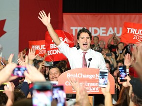 Liberal leader Justin Trudeau greets supporters upon arriving at the podium during a rally at St. James Civic Centre in Winnipeg on Sat., Oct. 17, 2015. Many believe his party stands a good chance to win more seats in Winnipeg this time around. (Kevin King/Winnipeg Sun/Postmedia Network)