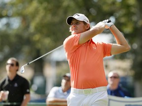 Emiliano Grillo, of Argentina, follows his shot from the seventh tee of the Silverado Resort North Course during the final round of the Frys.com golf tournament in Napa, Calif., on Oct. 18, 2015. (AP Photo/Eric Risberg)