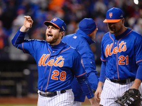 New York Mets second baseman Daniel Murphy (28) celebrates with teammates on the field after defeating the Chicago Cubs in game two of the NLCS at Citi Field. (Robert Deutsch-USA TODAY Sports)