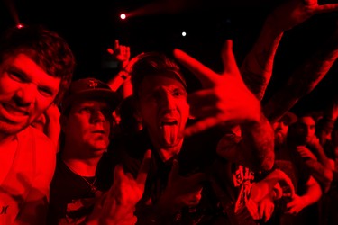 Slipknot fans cheer as the metal band performs at Rexall Place in Edmonton, Alta., on Sunday October 18, 2015. Ian Kucerak/Edmonton Sun/Postmedia Network
