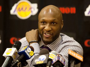 In this July 31, 2009, file photo, Los Angeles Lakers' Lamar Odom speaks to the media during a news conference after the Lakers signed Odom to a multi-year NBA basketball contract, in El Segundo, Calif. (AP Photo/Jeff Lewis, File)