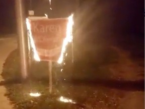 Ottawa Police said burning signs can come with mischief charges. CHARLES WICKHAM/VIDEO SCREENGRAB