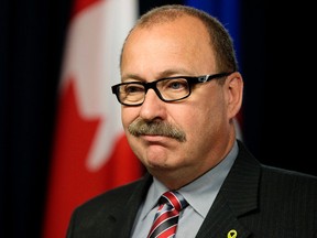 Alberta Progressive Conservative party leader Ric McIver speaks to the media during a press conference prior to the Speech from the Throne at the Alberta Legislature, in Edmonton Alta. on Monday June 15, 2015. David Bloom/Edmonton Sun