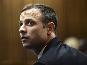 Oscar Pistorius was released on parole Monday night, about a year into his five-year sentence for killing his girlfriend Reeva Steenkamp, South African authorities said. (Antoine de Ras/Pool/Reuters/Files)