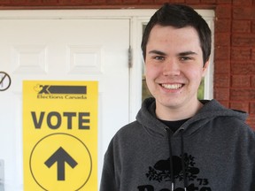 Kelly Banks, outside his polling station in Kingston on Monday turned 18 on Election Day and so got to vote for the very first time. (Michael Lea/The Whig-Standard)