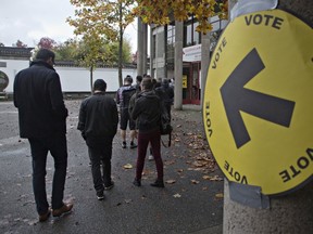 People line up to vote in downtown Vancouver, Oct. 19, 2015. REUTERS/Andy Clark