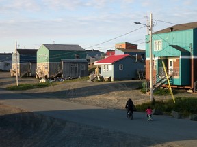 This picture taken on  September 16, 2015 shows a general view of a street of the Inuit village of Umiujaq, in Nunavik territory, Hudson Bay, Quebec.  (AFP PHOTO/CATHERINE HOURS)
