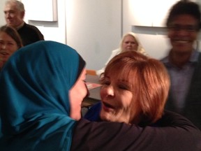 Irene Mathyssen hugs a supporter after being re-elected to London-Fanshawe. JONATHAN SHER / THE LONDON FREE PRESS