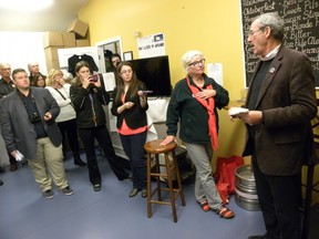 ERNST KUGLIN/THE INTELLIGENCER
With wife Joanne Belanger looking on, a stoic Terry Cassidy speaks to a small crowd at the Wild Card Brewing Company in Trenton, after conceding defeat around 10:20 p.m. Cassidy finished a distant third in the three-way race and said strategic voting played a huge role in the “disappointing” finish.
