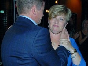 Conservative MP-elect Karen Vecchio shares a moment with her husband Mike at her campaign wrap party Monday night. Vecchio was declared the winner of the Elgin-Middlesex-London seat. (Jennifer Bieman/Times-Journal)