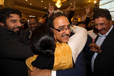 Edmonton - Mill Woods Liberal Amarjeet Sohi is congratulated by supporters as he arrives at the Maharaja Banquet Hall, 9257 - 34A Ave., in Edmonton Alta. on Monday Oct. 19, 2015. David Bloom/Edmonton Sun/Postmedia Network