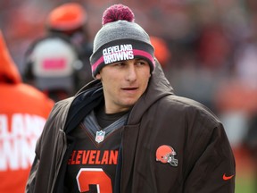 In this Sunday, Oct. 18, 2015, photo Cleveland Browns quarterback Johnny Manziel watches on the sidelines during the second half of an NFL football game against the Denver Broncos, in Cleveland. Police have released a dash-cam video and 9-1-1 emergency calls from a roadside incident involving Manziel. The former Heisman Trophy winner was questioned by Avon, Ohio, police last week after Manziel got into an argument with his girlfriend, Colleen Crowley. (AP Photo/Aaron Josefczyk)