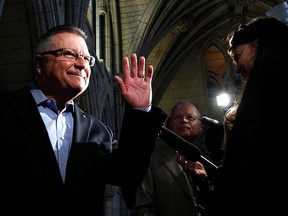 Liberal MP Ralph Goodale speaks to journalists as he arrives for a caucus meeting on Parliament Hill in Ottawa May 11, 2011.  REUTERS/Chris Wattie