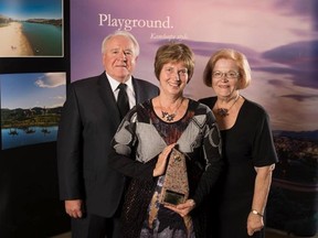 Gerry Teahen and Lorraine Hunter, the judges who visited Pincher Creek at the end of July, presented Diane Burt Stuckey with the Communities in Bloom Class of Champions (Small) award at the Symposium in Kamloops on Oct. 3.