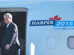 Stephen Harper boards the Conservative jet in Calgary, Alta. on Tuesday October 20, 2015 as he departs. Harper stepped down as party leader after the Conservatives lost to the Liberals in the federal election the night before. Jim Wells/Calgary Sun/Postmedia Network