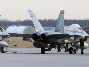 A CF-18 Hornet fighter jet takes off from 4 Wing Cold Lake on Tuesday, Oct. 21, 2014. (TREVOR ROBB/Postmedia Network File Photo)