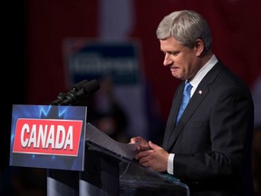 Stephen Harper pauses during his concession speech following the federal election in Calgary on October 19, 2015. (THE CANADIAN PRESS/Darryl Dyck)