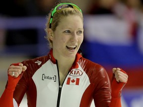 Team Canada's Kali Christ celebrates the win in her race in the women's 3000m event during the World All Around Speed Skating Championships at the Olympic Oval in Calgary on March 7, 2015. (Stuart Dryden/Calgary Sun)