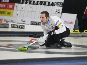 Skip Sven Michel of Switzerland throws a rock during the fifth draw of the Syncrude Elite 10 Grand Slam of Curling event  in Fort McMurray Alta. on Friday March 20, 2015. Robert Murray/Fort McMurray Today/QMI Agency