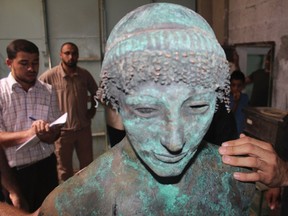 A bronze statue of the Greek God Apollo is pictured in Gaza in this September 19, 2013 picture provided by Gaza's Ministry of Tourism and Antiquities. (REUTERS/Gaza's Ministry of Tourism and Antiquities/Handout via Reuters)