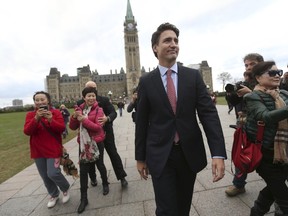 Canada's Liberal leader and Prime Minister-designate Justin Trudeau walks on Parliament Hill in Ottawa, Ontario, on Tuesday, October 20, 2015.  REUTERS/Chris Wattie