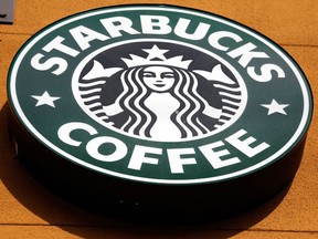 This Jan. 3, 2012 file photo, the Starbucks Coffee logo in Mountain View, Calif.  ( AP Photo/Paul Sakuma, File)