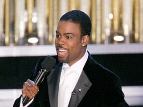 In this Feb. 27, 2005 file photo, Chris Rock hosts the 77th Academy Awa(AP Photo/Mark J. Terrill, File)