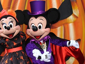 Mickey and Minnie Mouse get in the Halloween spirit. (WENN.com)